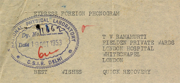 An old, worn phonogram with a blue oval stamp from the National Physical Laboratory in Delhi, dated October 19, 1953. It is addressed to T V Ramamurti at Thelden Private Wards, London Hospital, Whitechapel, London. The phrases BEST WISHES and QUICK RECOVERY are printed at the bottom.